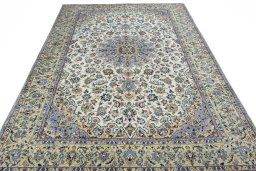 Surface texture of 1970s Kashan rug with natural Wool and intricate pattern