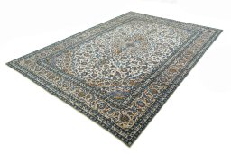Corner detail of 2000s Kashan rug showing border pattern and Wool pile