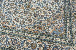 Close-up detail of 2000s Kashan rug from Iran / Persia showing Wool weave