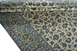 Close-up detail of 2000s Kashan rug from Iran / Persia showing Wool weave