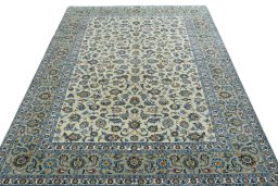 Surface texture of 2000s Kashan rug with natural Wool and intricate pattern