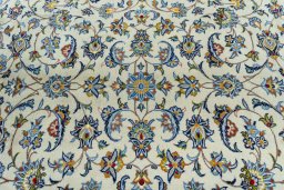 Central medallion detail of 2000s Kashan rug from Iran / Persia