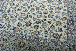 Close-up detail of 2000s Kashan rug from Iran / Persia showing Wool weave