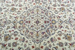 Central medallion detail of 2000s Kashan rug from Iran / Persia