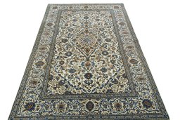 Surface texture of 2000s Kashan rug with natural Wool and intricate pattern
