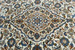 Central medallion detail of 2000s Kashan rug from Iran / Persia