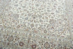 Close-up detail of 2000s Kashan rug from Iran / Persia showing Wool weave