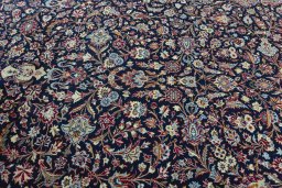 Central medallion detail of 2000s Kashan rug from Iran / Persia