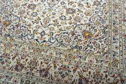 Close-up detail of 2000s Kashan rug from Iran / Persia showing Wool weave