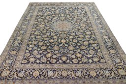 Surface texture of 2000s Kashan rug with natural Wool and intricate pattern