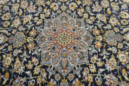 Central medallion detail of 2000s Kashan rug from Iran / Persia