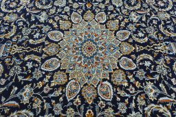 Central medallion detail of 2000s Kashan rug from Iran / Persia