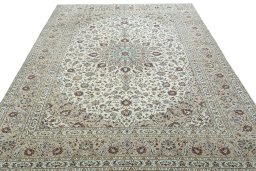 Surface texture of 2000s Kashan rug with natural Wool and intricate pattern