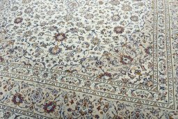 Close-up detail of 2000s Kashan rug from Iran / Persia showing Wool weave