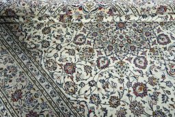 Close-up detail of 2000s Kashan rug from Iran / Persia showing Wool weave