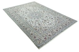 Close-up detail of 2000s Kashan rug from Iran / Persia showing Wool weave