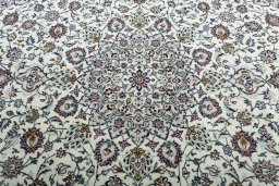 Central medallion detail of 2000s Kashan rug from Iran / Persia