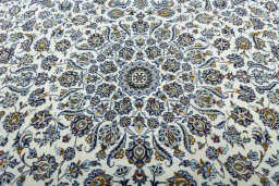 Central medallion detail of 2000s Kashan rug from Iran / Persia