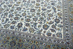 Close-up detail of 2000s Kashan rug from Iran / Persia showing Wool weave