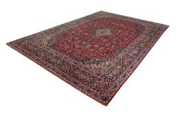 Corner detail of 1950s Kashan rug showing border pattern and Wool pile