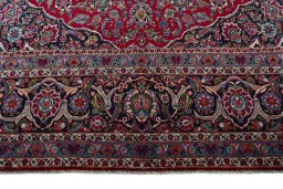 Full view of 1950s Kashan rug from Iran / Persia, 480 × 330 cm in Red tones