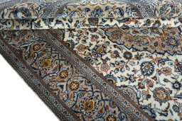 Close-up detail of 2000s Kashan rug from Iran / Persia showing Wool weave