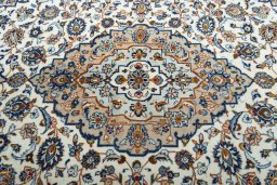 Central medallion detail of 2000s Kashan rug from Iran / Persia