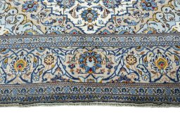 Full view of 2000s Kashan rug from Iran / Persia, 315 × 201 cm in Beige tones