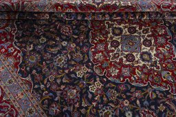 Close-up detail of 2000s Kashan rug from Iran / Persia showing Cork weave