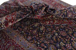 Surface texture of 2000s Kashan rug with natural Cork and intricate pattern
