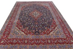 Surface texture of 2000s Kashan rug with natural Cork and intricate pattern