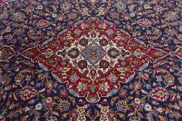 Central medallion detail of 2000s Kashan rug from Iran / Persia