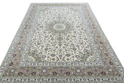 Surface texture of 2000s Kashan rug with natural Wool and intricate pattern
