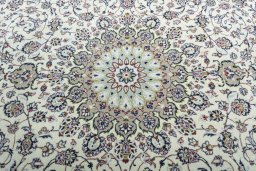 Central medallion detail of 2000s Kashan rug from Iran / Persia