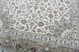 Close-up detail of 2000s Kashan rug from Iran / Persia showing Wool weave