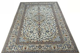 Surface texture of 2000s Kashan rug with natural Wool and intricate pattern