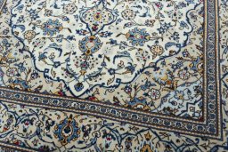 Close-up detail of 2000s Kashan rug from Iran / Persia showing Wool weave
