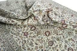 Surface texture of 2000s Kashan rug with natural Wool and intricate pattern