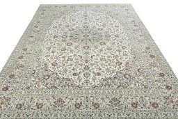 Surface texture of 2000s Kashan rug with natural Wool and intricate pattern