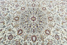 Central medallion detail of 2000s Kashan rug from Iran / Persia