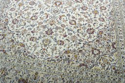 Close-up detail of 2000s Kashan rug from Iran / Persia showing Wool weave