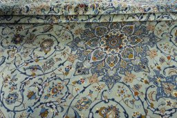 Close-up detail of 2000s Kashan rug from Iran / Persia showing Wool weave
