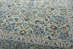 Close-up detail of 2000s Kashan rug from Iran / Persia showing Wool weave
