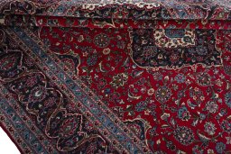Close-up detail of 2000s Kashan rug from Iran / Persia showing Wool weave