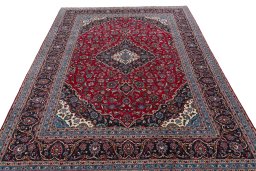 Surface texture of 2000s Kashan rug with natural Wool and intricate pattern