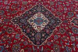 Central medallion detail of 2000s Kashan rug from Iran / Persia