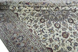 Close-up detail of 2000s Kashan rug from Iran / Persia showing Wool weave