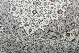 Close-up detail of 2000s Kashan rug from Iran / Persia showing Wool weave