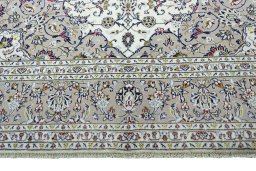 Full view of 2000s Kashan rug from Iran / Persia, 365 × 245 cm in Beige tones
