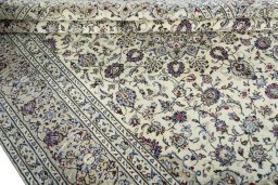 Close-up detail of 2000s Kashan rug from Iran / Persia showing Wool weave